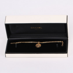 Pulsera con charm 1932 de oro y diamantes